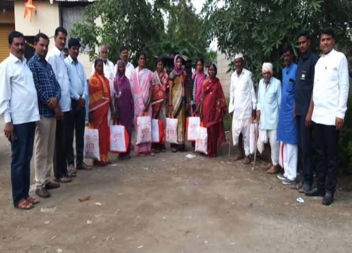 Cloths and Sweet distribution on Diwali in Nalwandi village, Beed. <br>
The Kute Group Foundation on every Diwali tries to add brightness to the life of needy farmers and their families. Under CSR initiatives it always tries to promote happiness in the lives of less fortunate so they too enjoy the festive season. Clothes and Delecisies were distributed in the villages of Jeba Pimpri, Nalwandi, and Imampur villages of Beed district, in the year 2019.

